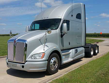 Image of a tractor uncoupled from a trailer.